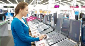 solidworks requirements. woman shopping for a laptop.