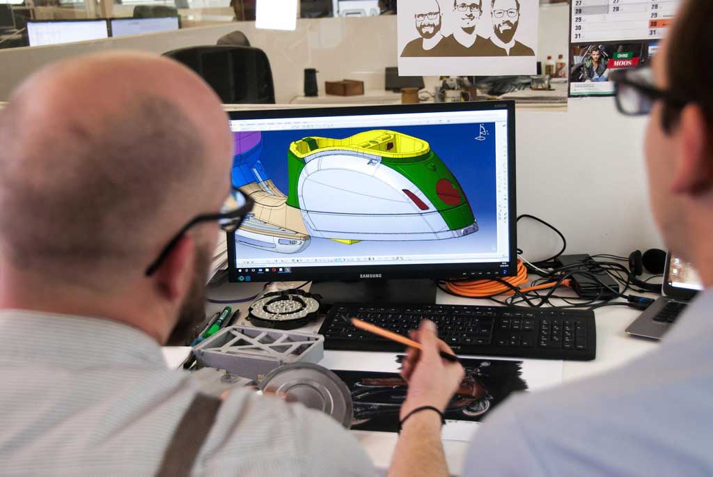 Mechanical design engineers commonly collaborate and critique drawings together to have different perspectives on designs.