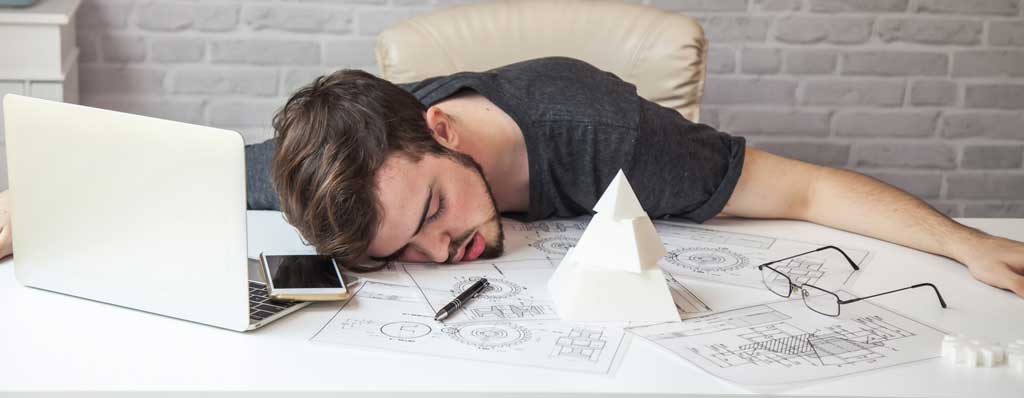 mechanical-engineer-asleep-at-the-desk